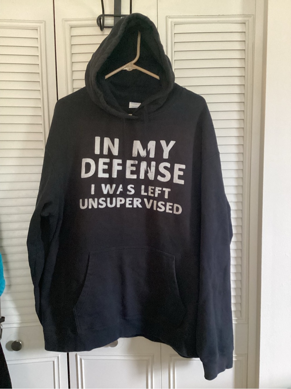 Black Hoodie Sweatshirt with White Text - Casual Men's Pullover